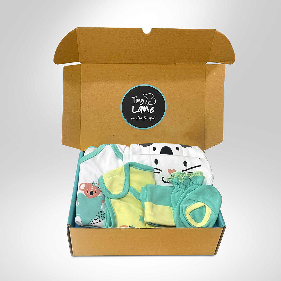 Neonatal Essentials - (set of 7) variant 1: Onesie - 1kresent koala + 2 Nappy +1 mint green CBM +1 KK bib+ blue Dry mat