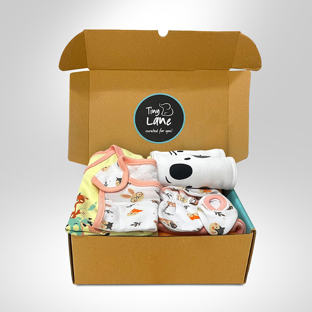 Neonatal Essentials - (set of 7) - variant - 3| Onesie - Jolly ride + 2 Nappy +1 Animal face CBM +1 Animal face bib+ Orange Dry mat